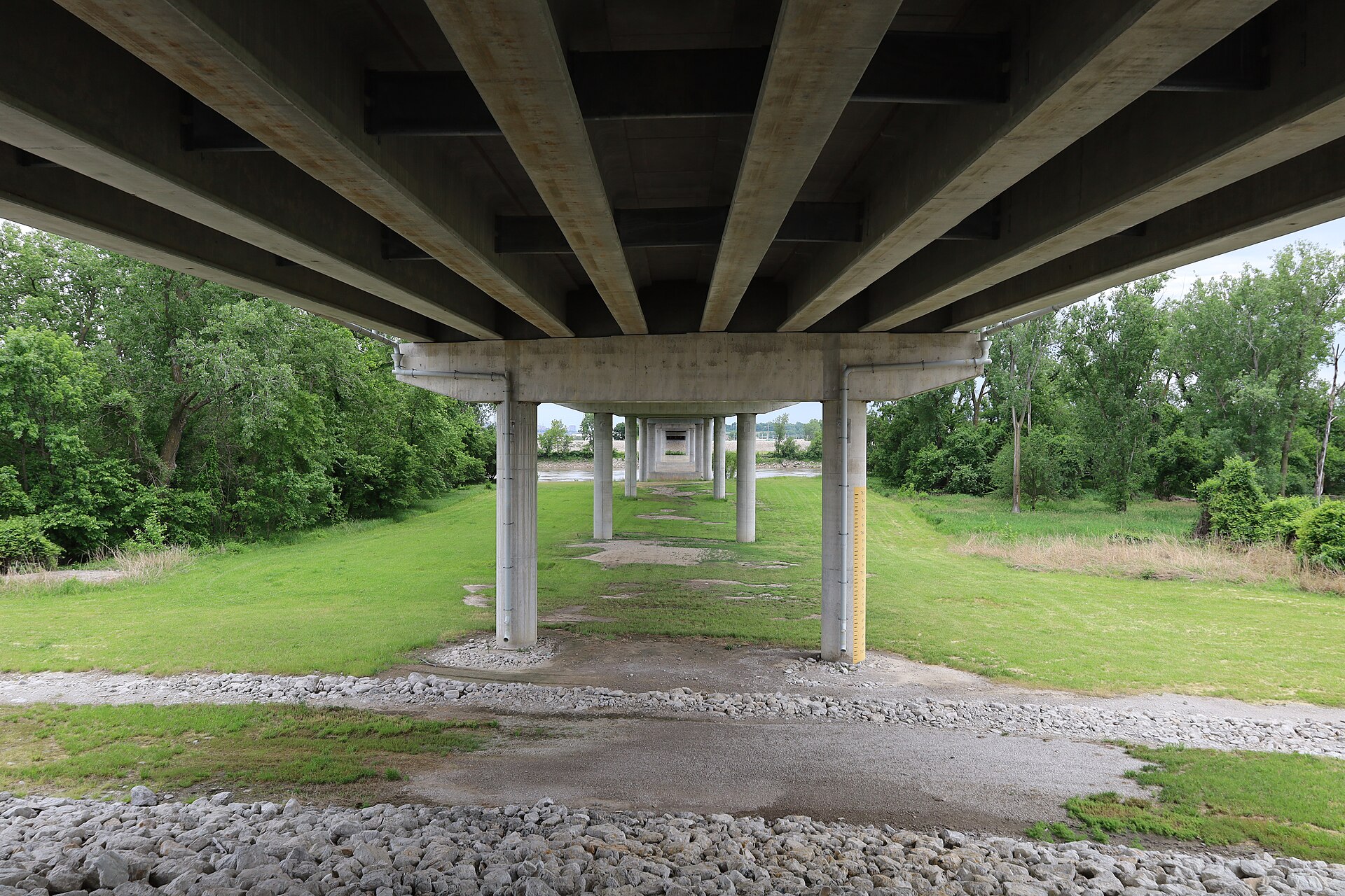 Riverside Missouri residential neighborhood with established homes and trees near the river